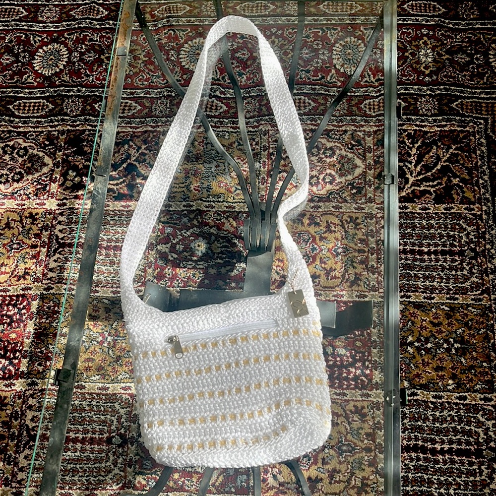 White purse with yellow sequins